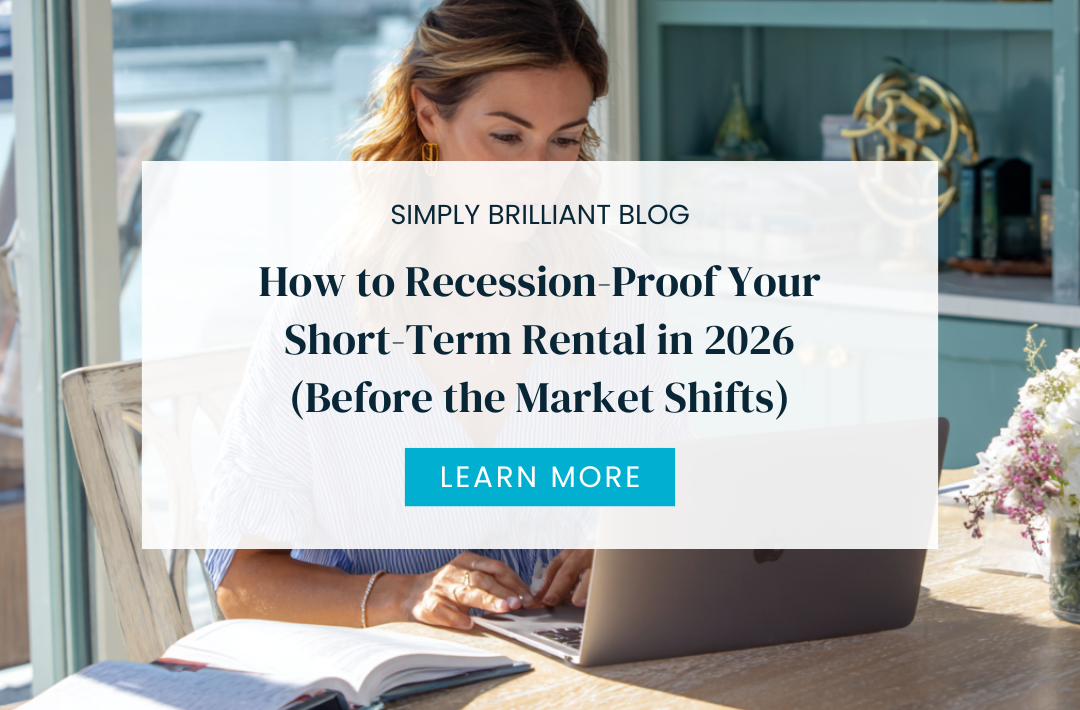 STR host reviewing recession-proof short-term rental strategy on laptop